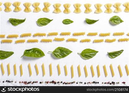 top view fusilli farfalle penne pasta arrangement