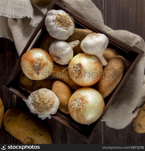 top view garlic onions crate. High resolution photo. top view garlic onions crate. High quality photo
