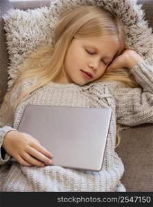 top view girl sleeping with tablet