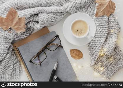 top view glasses agenda with coffee cup