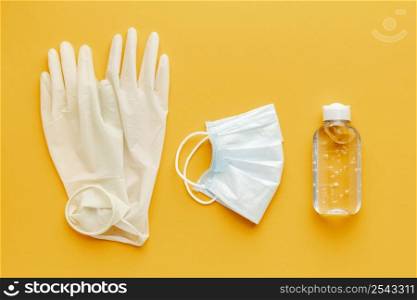 top view gloves with medical mask hand sanitizer