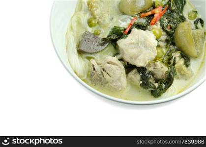 top view green chicken curry served with rice vermicelli in white bowl over white background