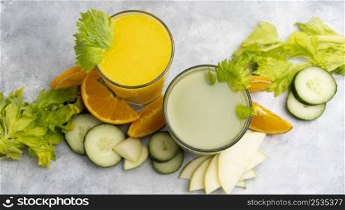 top view green orange juices