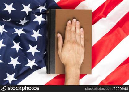 top view hand book american flag