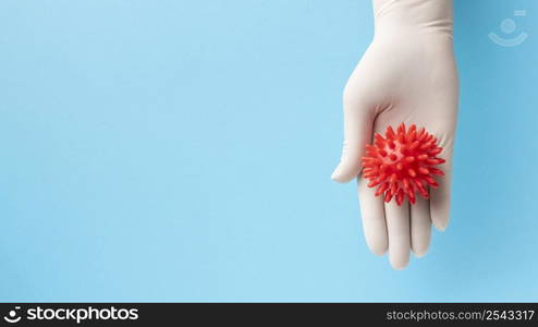 top view hand holding virus with copy space