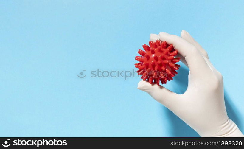 top view hand with glove holding virus with copy space. Resolution and high quality beautiful photo. top view hand with glove holding virus with copy space. High quality beautiful photo concept