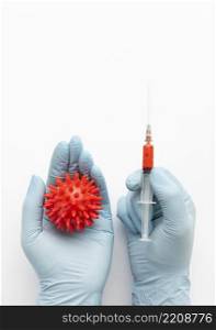 top view hands holding syringe virus