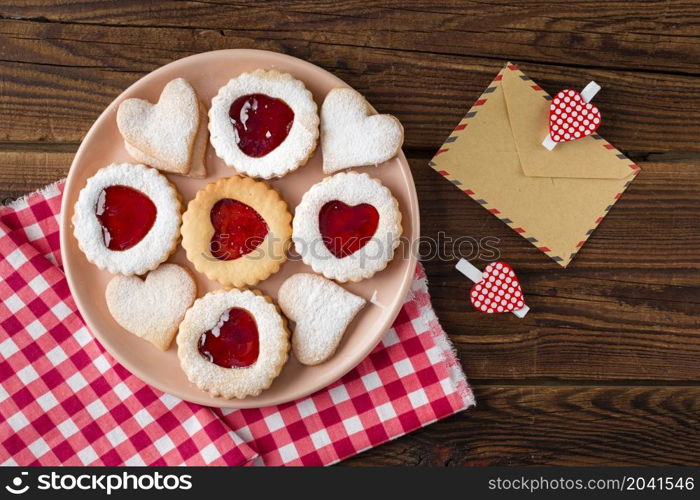 top view heart shaped cookies plate with jam