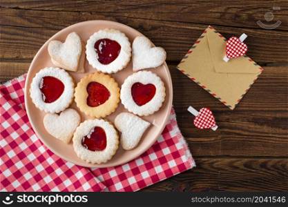 top view heart shaped cookies plate with jam