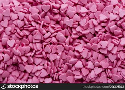 top view heart shaped pink sweets