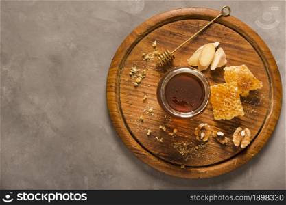 top view honey jar with food honeyspoon. Resolution and high quality beautiful photo. top view honey jar with food honeyspoon. High quality beautiful photo concept