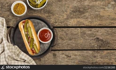 top view hot dog with pickles plate