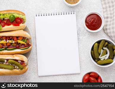 top view hot dogs notebook
