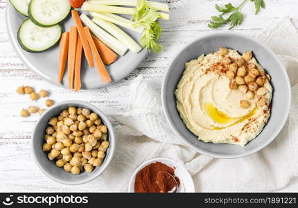 top view hummus with chickpeas vegetables. Resolution and high quality beautiful photo. top view hummus with chickpeas vegetables. High quality and resolution beautiful photo concept