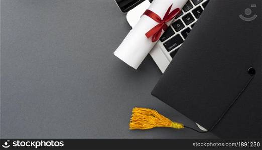 top view laptop with diploma academic cap. Resolution and high quality beautiful photo. top view laptop with diploma academic cap. High quality and resolution beautiful photo concept