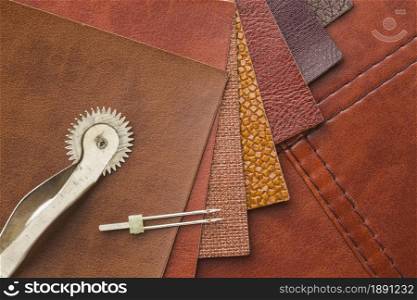 top view leather with needle. Resolution and high quality beautiful photo. top view leather with needle. High quality and resolution beautiful photo concept