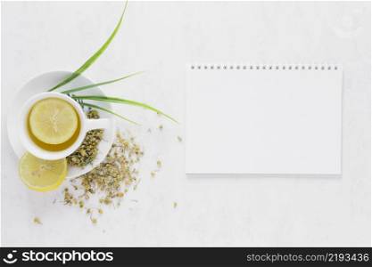 top view lemon tea with notebook