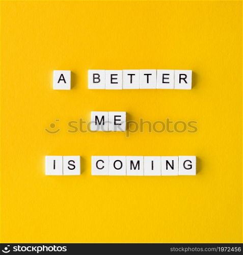 top view letter cubes yellow background. High resolution photo. top view letter cubes yellow background. High quality photo