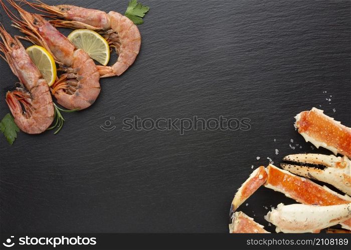 top view lobsters shrimps with lemon