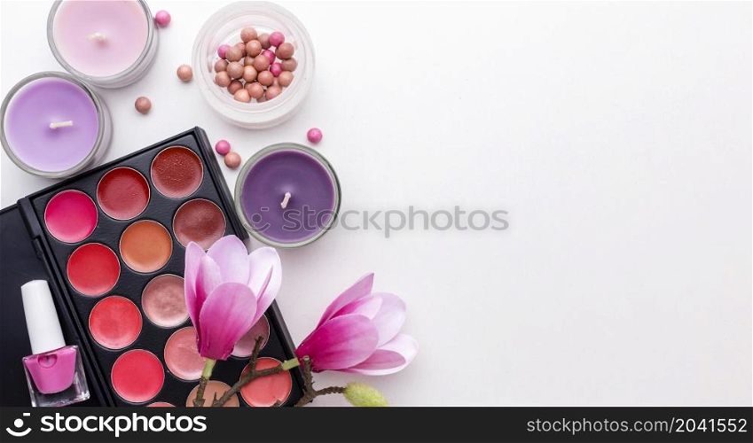 top view make up products candles with copy space