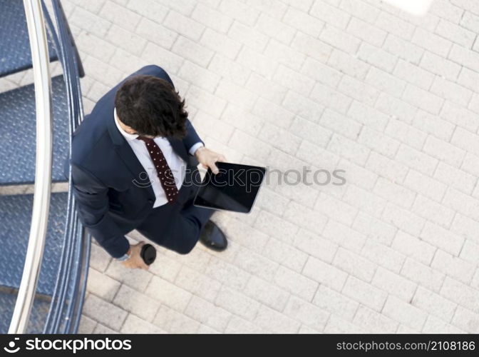 top view man suit with tablet