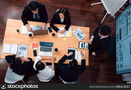 Top view manager or office worker give presentation in harmony conference room to business colleague, BI data dashboard on screen and pile of financial analyzed data reports on meeting table.. Top view business presentation at harmony conference room with colleagues.