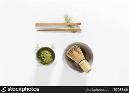 top view matcha concept with bamboo whisk