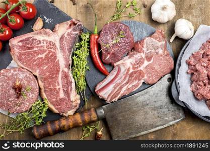 top view meat with garlic herbs. Resolution and high quality beautiful photo. top view meat with garlic herbs. High quality and resolution beautiful photo concept