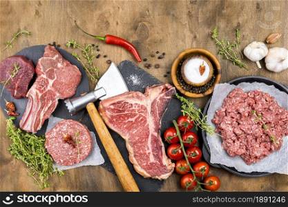 top view meat with herbs tomatoes. Resolution and high quality beautiful photo. top view meat with herbs tomatoes. High quality and resolution beautiful photo concept