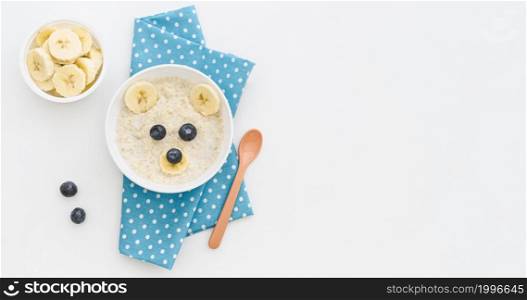 top view milk oat flakes with fruits with copy space