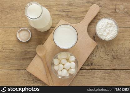 top view milk on wooden background. Resolution and high quality beautiful photo. top view milk on wooden background. High quality and resolution beautiful photo concept