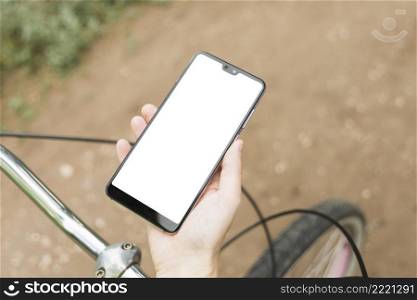 top view mockup smartphone with defocused bicycle