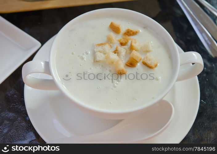 top view mushroom cream soup in white bowl