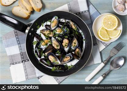 top view mussels with parsley lemon. High resolution photo. top view mussels with parsley lemon. High quality photo
