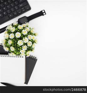 top view notebook flowers frame