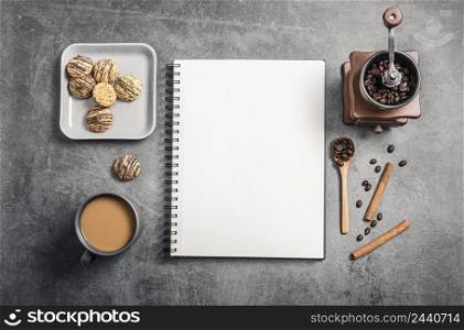 top view notebook with coffee cup grinder