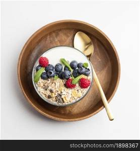 top view oatmeal bowl with raspberries blueberries2. Resolution and high quality beautiful photo. top view oatmeal bowl with raspberries blueberries2. High quality beautiful photo concept