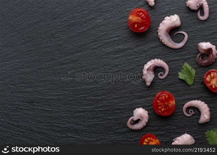 top view octopus pieces with vegetables