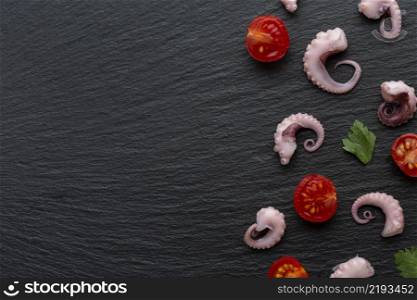 top view octopus pieces with vegetables