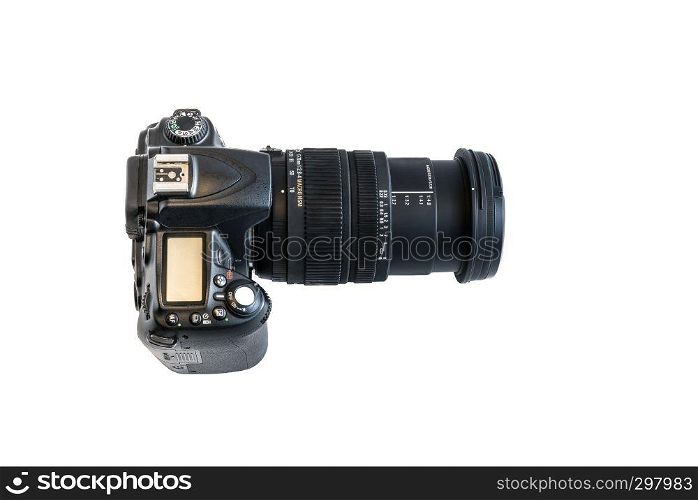 Top view of a digital dslr professional photo camera for photography students, freelance photo journalism, photographic bloggers, or creative travel photographer, isolated on white.. Top view of a digital dslr professional photo camera for photography students, freelance photo journalism, photographic bloggers, or creative travel photographer, isolated on white