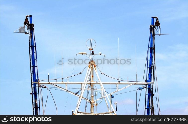 Top view of a fishing boat with rigging.