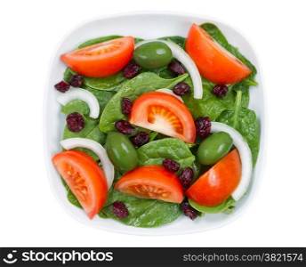 Top view of a freshly made salad, in white plate, isolated on white background