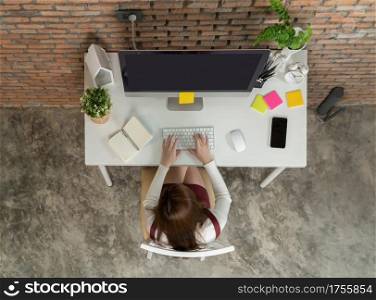 Top view of Asian business woman, person working from home, typing on a keyboard with computer in conference call in technology network and device concept. Lifestyle