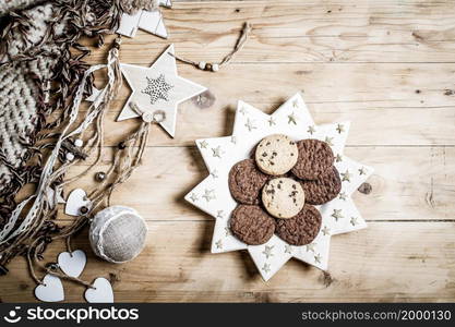 top view of beige and green Christmas decorations cozy home hygge