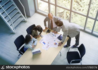 Top view of business people are meeting in office , business teamwork concept .