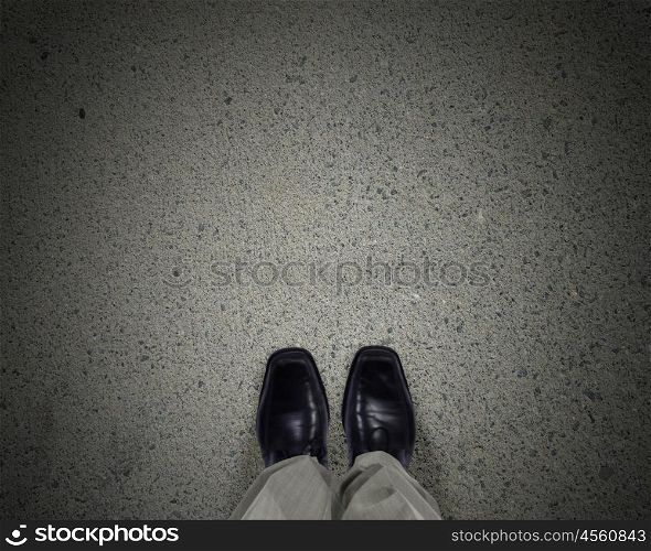 Top view of businessman legs choosing his way. Find your own way