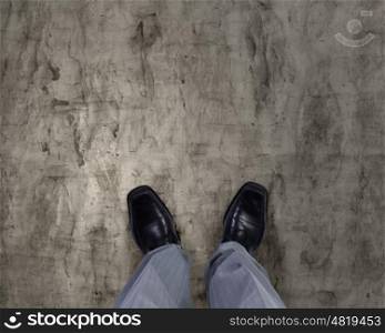 Top view of businessman legs choosing his way. Find your own way