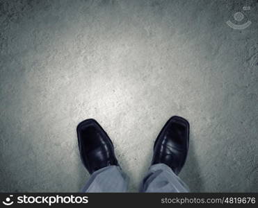 Top view of businessman legs choosing his way. Find your own way