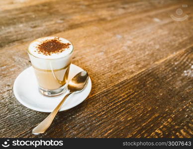 top view of cappuccino coffee dress up, in white cup. top view of cappuccino coffee dress up in white cup