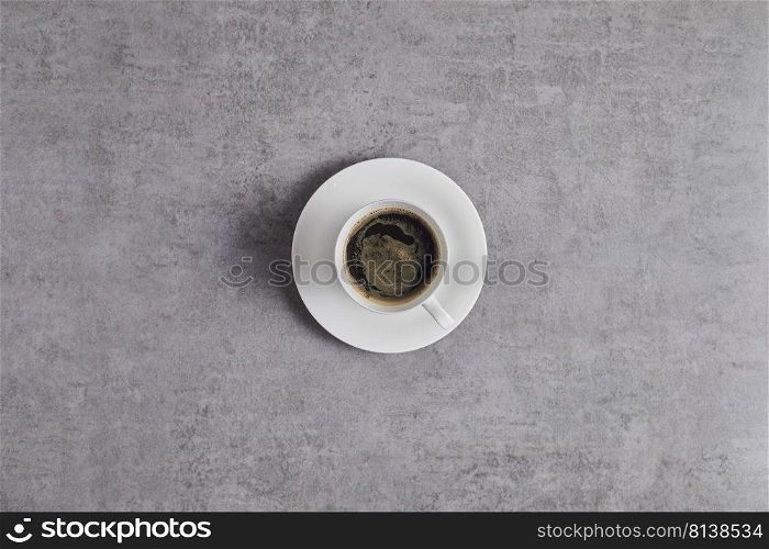 Top view of coffee cup on background. 